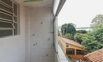 Imagem 5: Acheimob oferta um espaçoso e ensolarado apartamento que possui 2 dormitórios sendo 1 suit