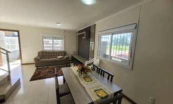 Imagem 6: Sobrado para venda possui 112 metros quadrados com 3 quartos em Zona Nova - Tramandaí - RS