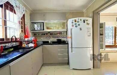 Imagem 7: Casa em Porto Alegre, no bairro Espirito Santo, com 3 dormitório(s), e 3 banheiros, à vend