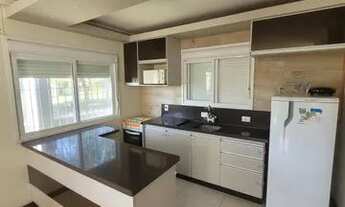 Imagem 2: Sobrado para venda possui 112 metros quadrados com 3 quartos em Zona Nova - Tramandaí - RS