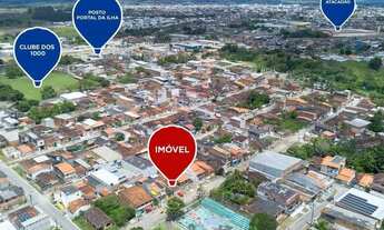 Imagem 3: Casa Confortável e Prática no Clube dos 1000