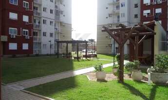 Imagem 5: Apartamento constituído por 02 dormitórios, sala de estar, sacada, cozinha, churrasqueira