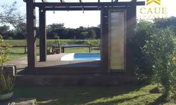 Imagem 4: Casa em condomínio fechado com lagoa