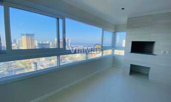 Imagem 2: Apartamento para venda tem 80 metros quadrados com 3 quartos em Centro - Tramandaí - RS