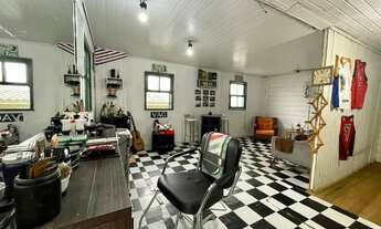 Imagem 6: UM TERRENO COM UMA CASA SIMPLES