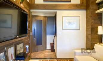 Imagem 3: Sala mobiliada, com churrasqueira para happy hour e vista para o Guaíba