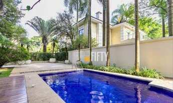 Imagem 5: Espetacular Casa em Condomínio de Alto-Padrão próximo da Chácara Flora com 4 suítes/Piscin