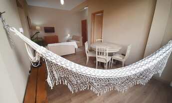 Imagem 3: Apto grande com rede de descanso na sala