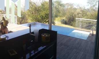 Imagem 3: Casa á venda e locação com 04 suítes,piscina,varanda gourmet,planejados,vista panorâmica,v