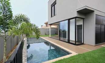 Imagem 2: Casa de condomínio para venda possui 346 metros quadrados com 4 quartos