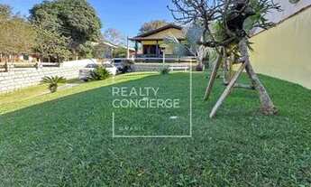 Imagem: Terreno de 520m² com casa de 150m² na