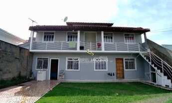 Imagem: Casa com 7 dormitórios à venda, 200 m²