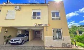 Imagem 2: Casa Condominio em Porto Alegre, no bairro Ipanema, com 3 dormitório(s), e 3 banheiros, à