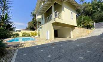 Imagem 7: CASA DE ALTO PADRÃO COM 3 SUÍTES, PISCINA E CERCADA POR ÁREA VERDE NO BAIRRO ANITA GARIBAL