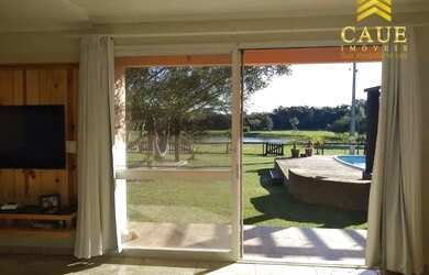 Imagem 6: Casa em condomínio fechado com lagoa