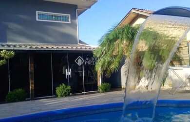 Imagem: Casa 3 dormitórios, sendo 3 suítes, banheira