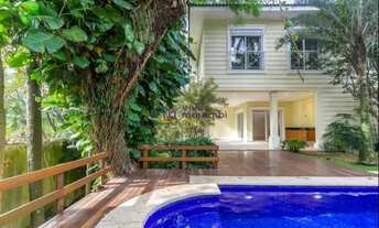 Imagem 2: Casa condomínio. 4 dormitórios. 4 suites. 5 vagas. 710 m2