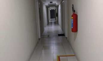 Imagem 6: Sala comercial, vazia, andar alto, vista livre. Ideal para investidores e profissionais li