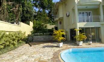 Imagem 2: CASA DE ALTO PADRÃO COM 3 SUÍTES, PISCINA E CERCADA POR ÁREA VERDE NO BAIRRO ANITA GARIBAL