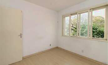 Imagem 7: Acheimob oferta um espaçoso e ensolarado apartamento que possui 2 dormitórios sendo 1 suit