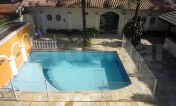 Imagem 2: Residência frente praça no condomínio Jardim Acapulco