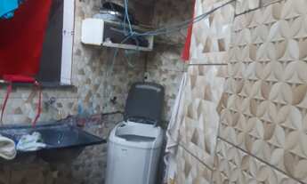 Imagem 6: Vendo uma casa com um prédio no fundo