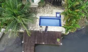 Imagem 2: Casa em Condomínio a beira Mar com Píer para atracar Lancha-1.200 m2