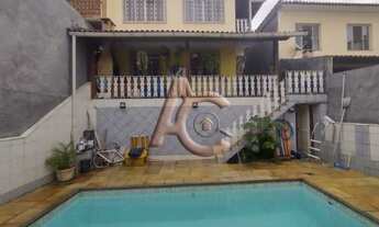 Imagem 2: Casa única no terreno com piscina,churrasqueira e vaga de garagem