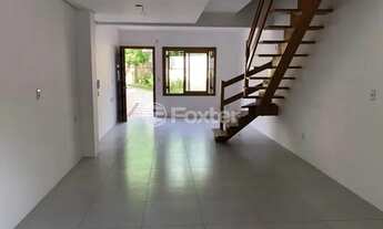 Imagem 2: Casa de condomínio sobrado para venda possui 106 metros quadrados com 2 quartos e pátio