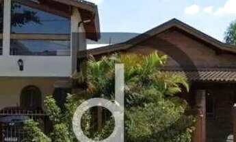 Imagem: Casa com 4 quartos, sendo 3 suítes, para