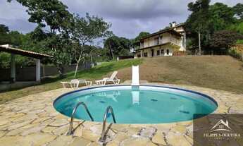 Imagem 2: Casa à venda em Miguel Pereira com 3 quartos, 1 suíte, piscina, área gourmet e amplo terre