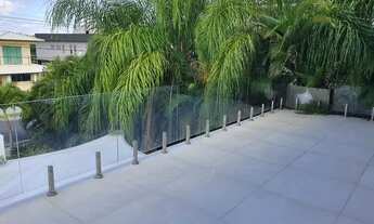 Imagem 7: Elegantíssima mansão no Alphaville litoral norte 1 com 992m2 e 560m2 de área construída