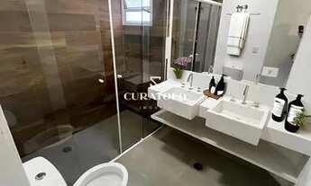 Imagem 5: Sua moradia de Alto Padrão Pronta para Morar: Casa com 3 Suítes, 2 Vagas e Área Gourmet co