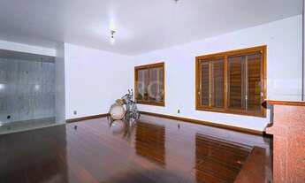 Imagem 4: Venda Padrão - Porto Alegre - Casa com 5 dormitórios, suíte, piscina, lareira, churrasqu