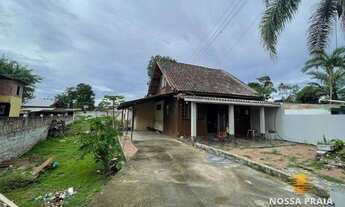 Imagem: Casa de madeira em terreno sozinho à venda
