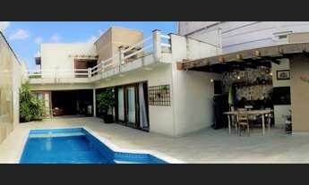 Imagem: Casa com 4 quartos e piscina em itanhaem