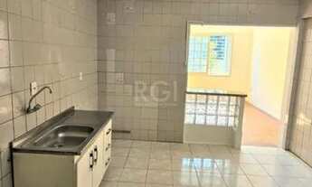 Imagem 1: Apartamento 2 dormitórios térreo com pátio, living 2 ambientes, churrasqueira, banheiro, c