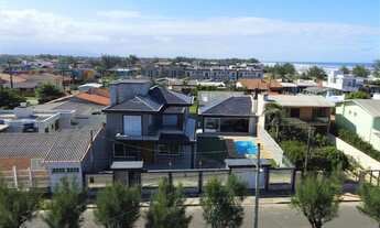 Imagem 5: Casa para venda tem 300 metros quadrados com 4 quartos em Arco Iris - Capão da Canoa - RS