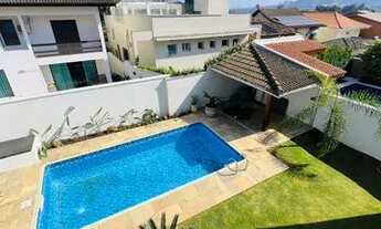 Imagem 3: Casa de condomínio para aluguel e venda tem 288 metros quadrados com 4 quartos