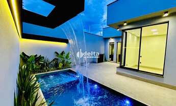 Imagem 2: Casa residencial com 3 suítes disponível para venda no bairro Grand Ville em Uberlândia-MG