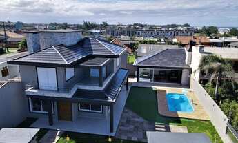 Imagem 2: Casa para venda tem 300 metros quadrados com 4 quartos em Arco Iris - Capão da Canoa - RS