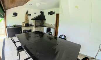 Imagem 5: Casa de condomínio para aluguel e venda possui 422 metros quadrados com 4 quartos