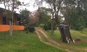 Imagem 7: Casa de campo com piscina e lago