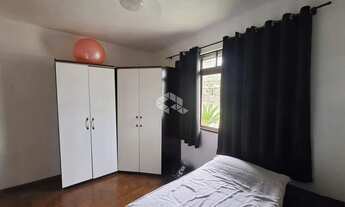 Imagem 5: CASA 4 DORMITÓRIOS NO SARANDI COM GARAGEM, CHURRASQUEIRA, PÁTIO E ÁRVORES FRUTÍFERAS