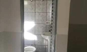 Imagem 3: Suíte com cozinha integrada e área de serviço (kitnet