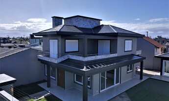 Imagem 6: Casa para venda tem 300 metros quadrados com 4 quartos em Arco Iris - Capão da Canoa - RS