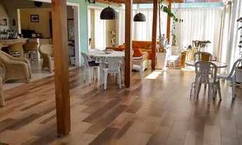 Imagem 2: Casa para venda com 150 metros quadrados com 4 quartos em Riviera - Bertioga - SP