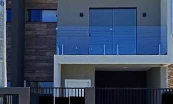 Imagem 2: VALOR PROMOCIONAL! Sobrado alto padrão a apenas 500 metros da praia com 3 dormitórios à ve