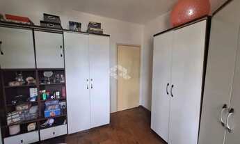 Imagem 4: CASA 4 DORMITÓRIOS NO SARANDI COM GARAGEM, CHURRASQUEIRA, PÁTIO E ÁRVORES FRUTÍFERAS