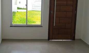 Imagem 6: Casa térrea com 2 quartos no Parque Guará com arquitetura moderna e pé direito duplo na sa